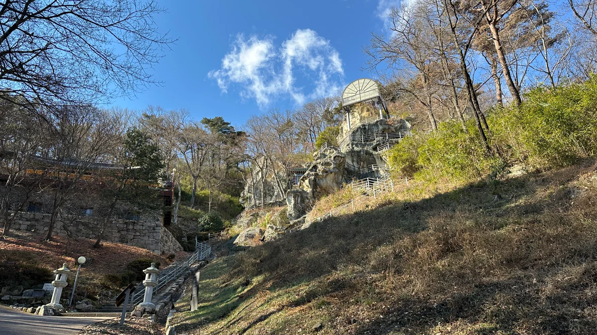 The rock-carved Buddha and steep hillside stairways at Golgulsa Temple near Gyeongju.
